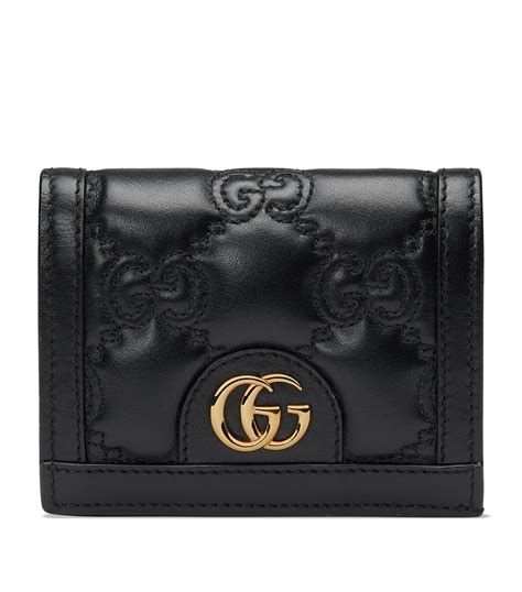 Questions about gucci wallet leather or canvas 